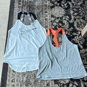 Nike bundle of two Dri-Fit tank tops in size small